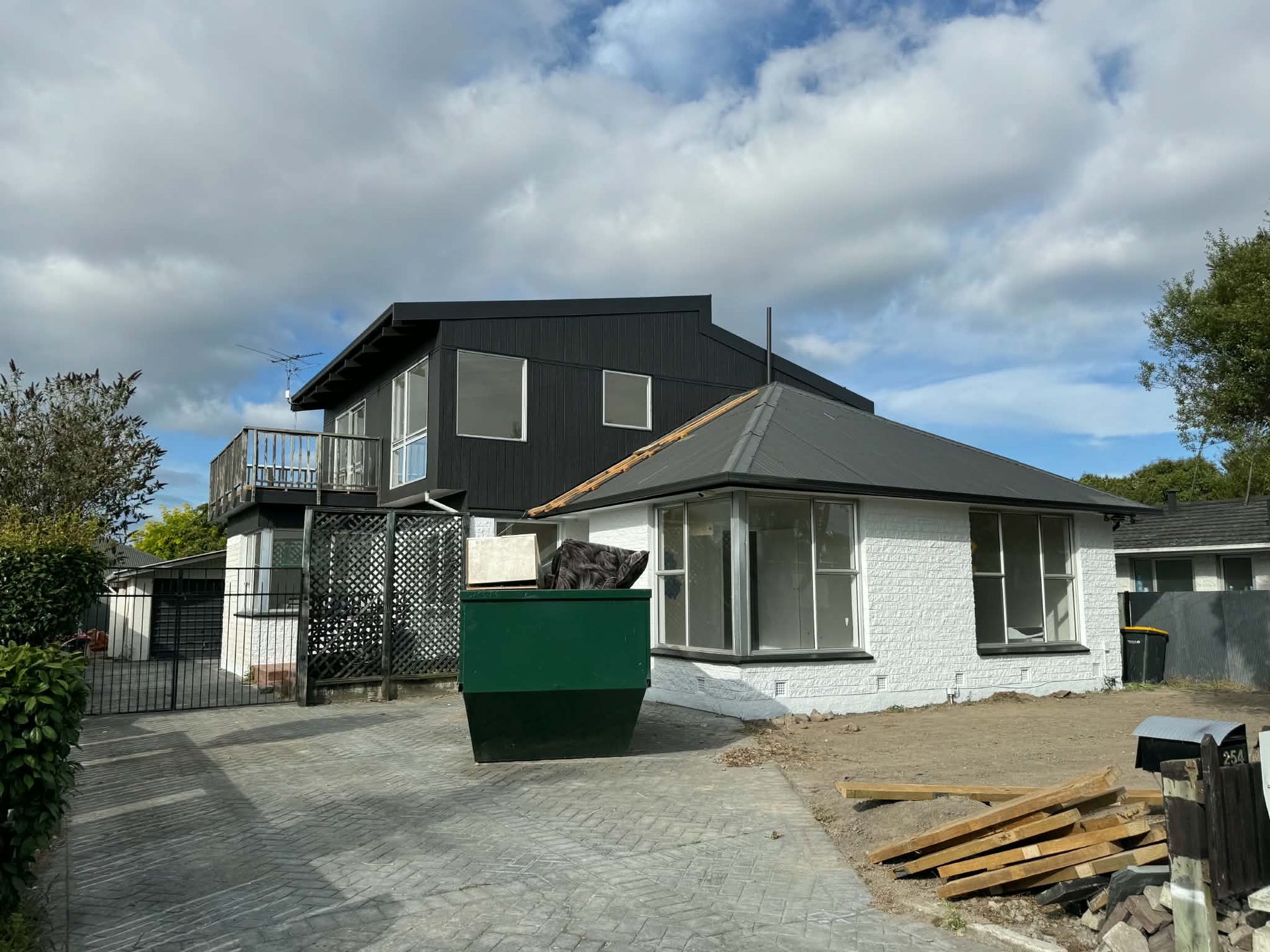 Exterior repaint underway on a two-storey Canterbury home